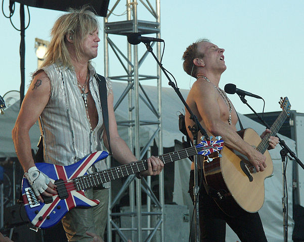 Rick Savage of Def Leppard with Collen